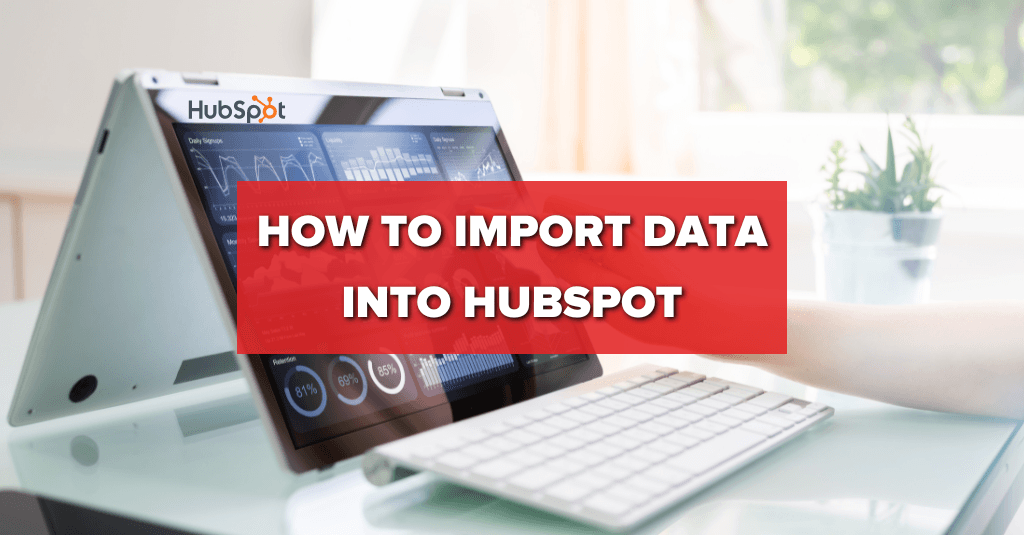 text "how to import data into hubspot" with laptop in background in office area  