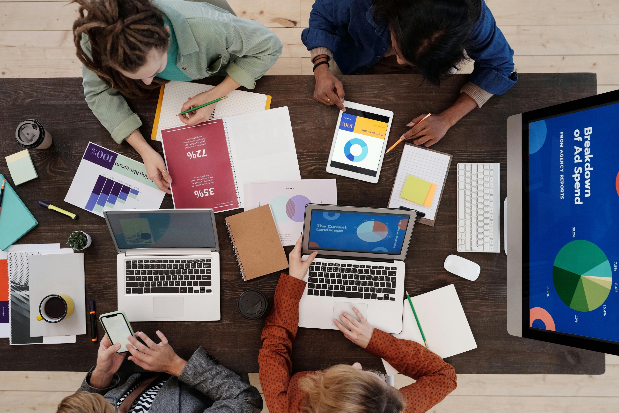 A group of people working in a table